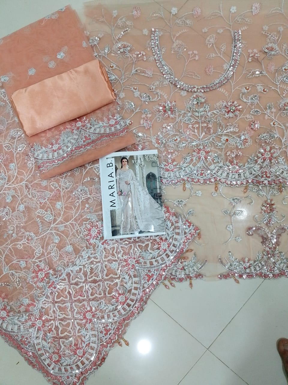 Sana Yousaf wearing pale pink beaded saree